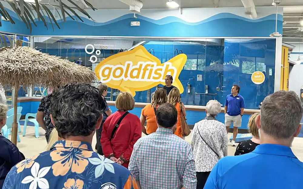 Goldfish Swim Schools Franchisee talking to people