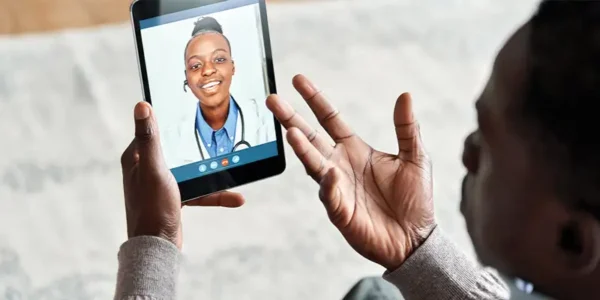 person speaking to a physician using telehealth